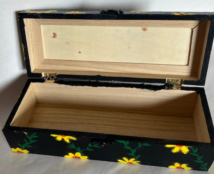 A hand painted black gift box
