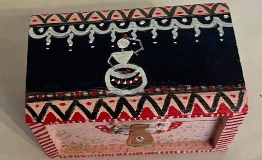 Pink hand painted wooden trinket with warli art.