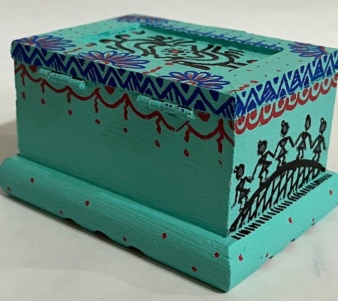 A Warli art pink hand painted wooden box with lid