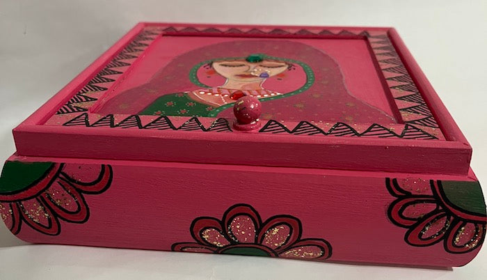 A hand painted pink jewelry box 