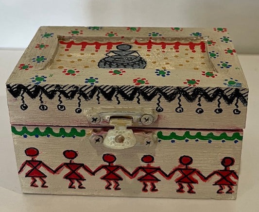 An off white hand painted warli art gift box