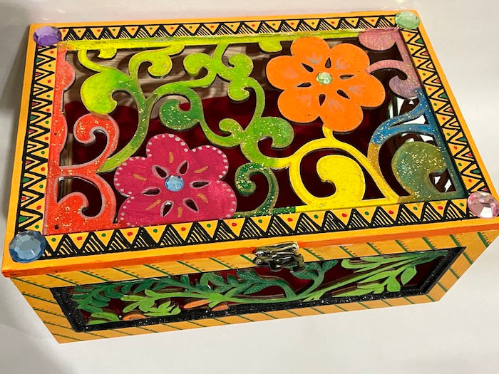 A beautiful hand painted laser cut gift box