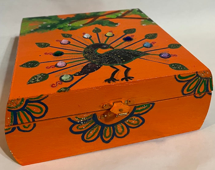 A hand painted bright and beautiful orange peacock art gift box