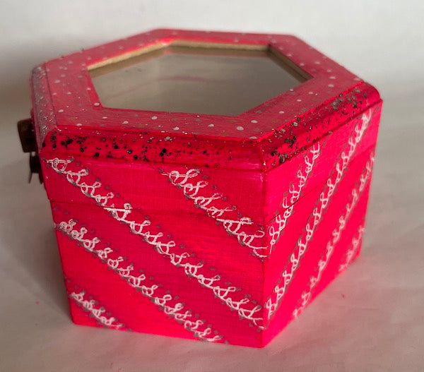 A  side view of pink jewelry box hand made