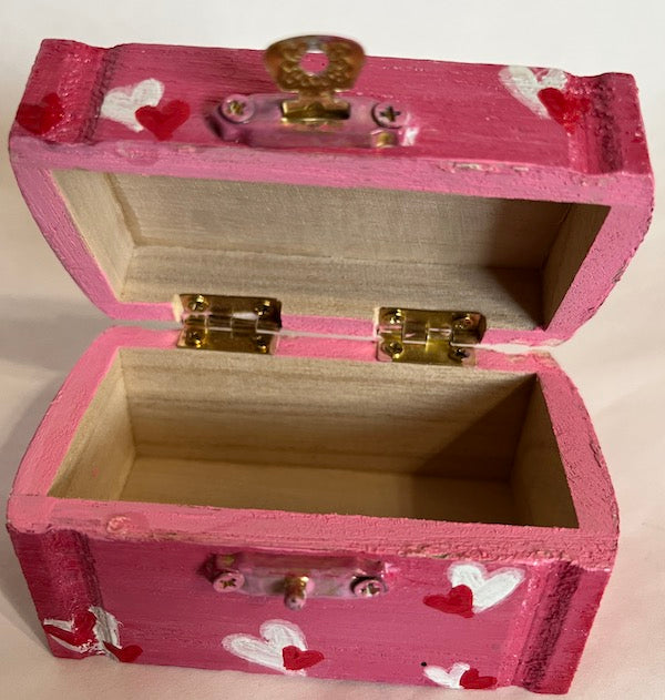A pink heart wooden box