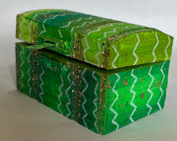 A hand painted green gift box