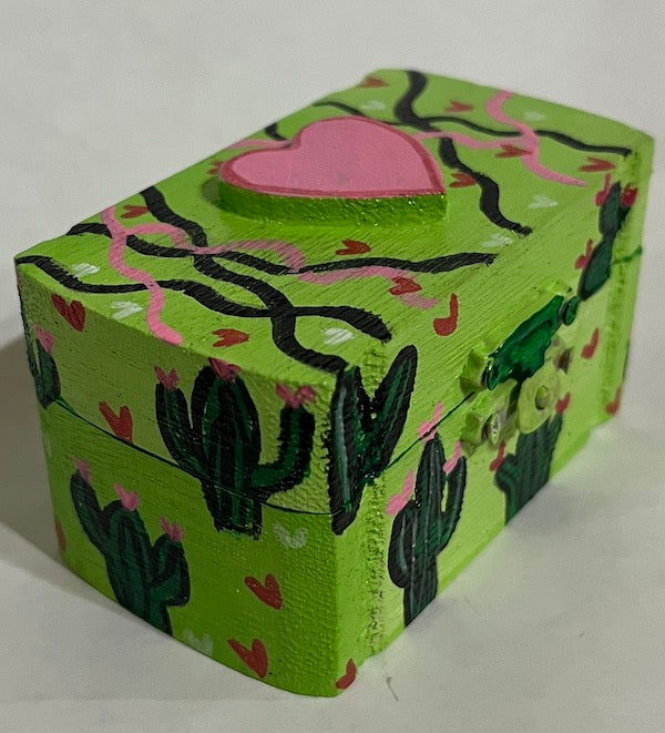 A small green hand painted wood box with lid 