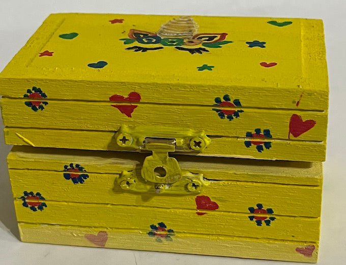 A yellow bright and beautiful hand painted unicorn box