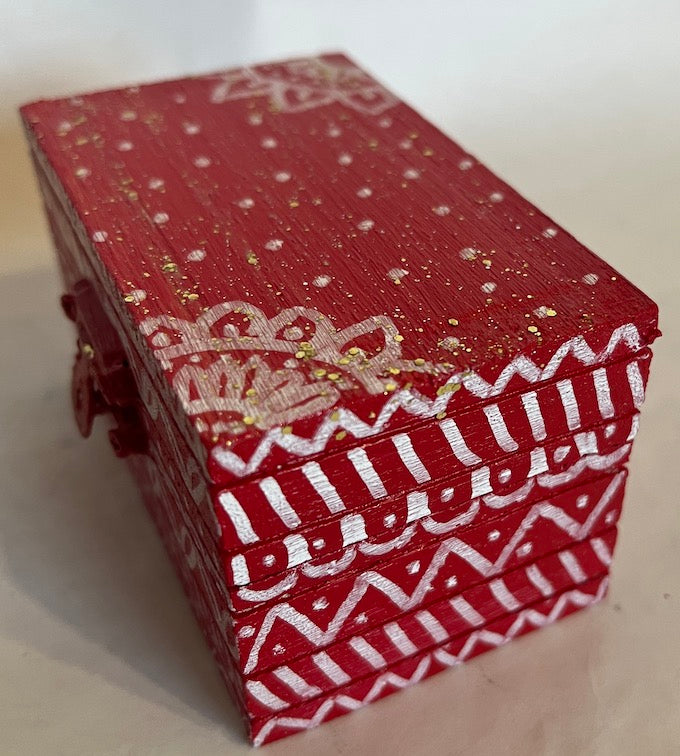 A beautiful hand painted red gift box.