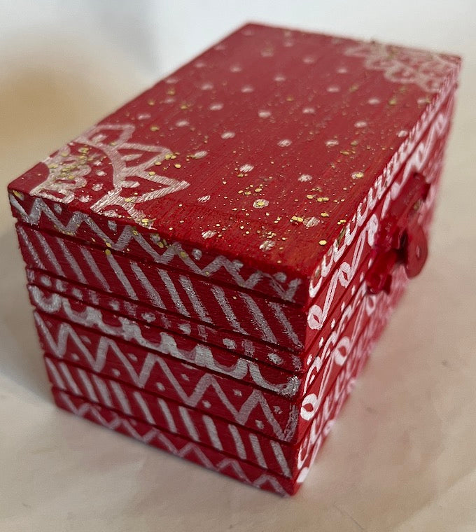 A red small hand painted festive accessory gift box