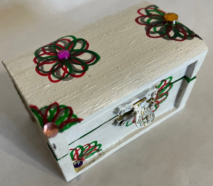 A white hand painted wooden trinket with lid and gem top