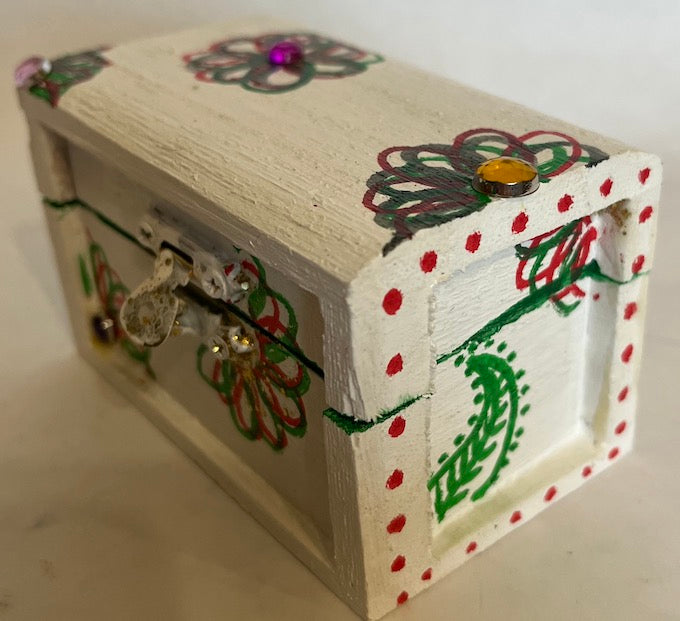 A white hand painted wooden trinket with lid and gem top