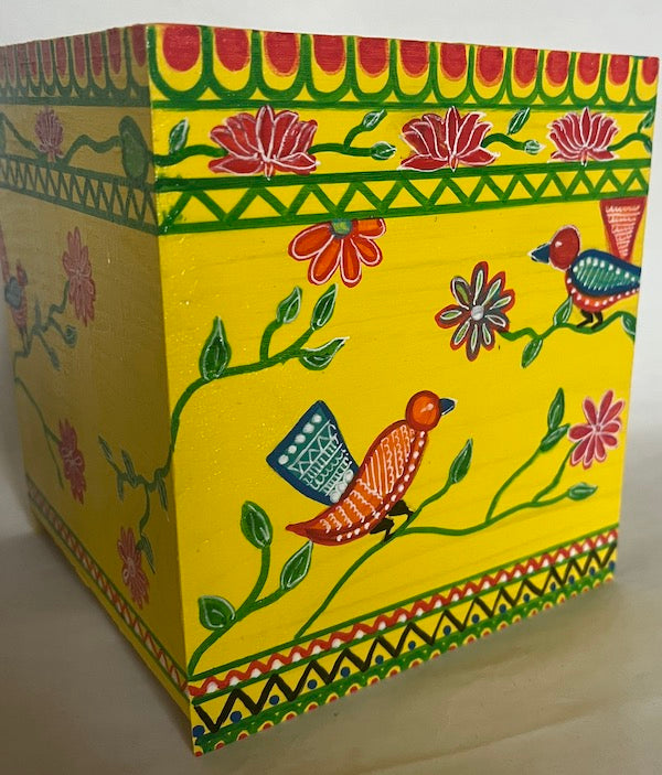 A colorful bird and floral art hand painted wooden tissue box cover